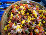 bowls of salsa with beans and corn